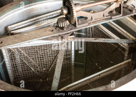 Honey extractor. Device for extracting honey from honeycombs. Stock Photo