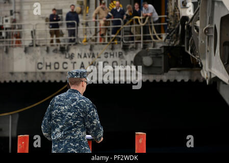 151230-N-IL474-291  SOUDA BAY, Greece (Dec. 30, 2015) – Port Operations Officer, Lt. Daniel M. Woods, prepares to give an inbrief to civil service mariners aboard The Military Sealift Command Expeditionary Fast Transport ship, USNS Choctaw County (T-EPF 2),  after its arrival in Souda Bay for a scheduled port visit Dec. 30, 2015 .  Choctaw County is the second of 10 vessels designed for rapid intra-theater transportation of troops and military equipment.  (U.S. Navy photo by Heather Judkins/Released) Stock Photo