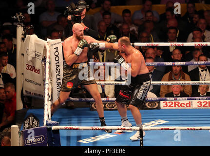 Tyson Fury (left) in action against Francesco Pianeta during their Heavyweight fight at Windsor Park, Belfast. Stock Photo