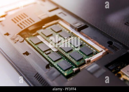 Close up RAM stick on Socket laptop Stock Photo