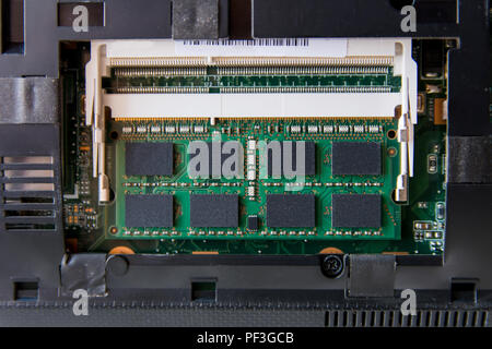 Close up RAM stick on Socket laptop Stock Photo