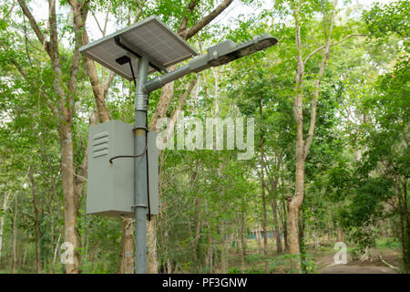 outdoor lighting pole, street light led pole with small solar cell panel in public park Stock Photo