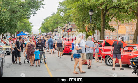 Crowds attend the 20th Annual Orillia Downtown Car Show, one of the largest in the region. Stock Photo