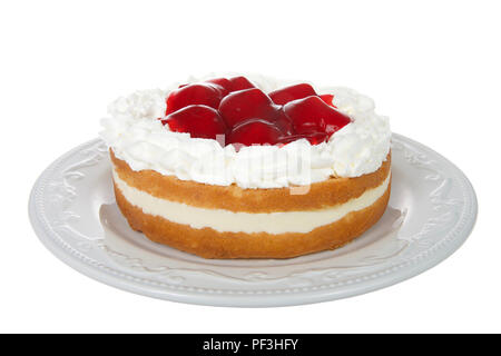 Light refreshing vanilla cake with cream filling, topped with whipped cream and glazed whole strawberries. Fresh summer fruit. Isolated on white backg Stock Photo