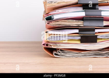 Stacked documents on the office desk. Stock Photo
