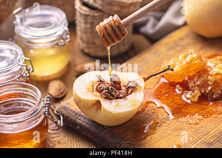 Sweet baked pears with honey, walnuts Horizontal Stock Photo