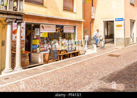 Tourist street deli shop with traditional Italian products in Cividale del Friuli, Italy Stock Photo