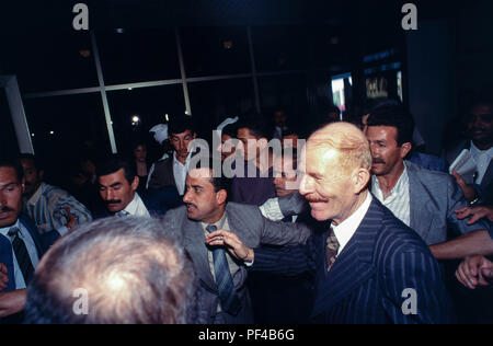 Baghdad, Iraq - 16 October 1995 - Izzat Ibrahim al-Douri, Iraqi statesman and Vice Chairman of the Iraqi Revolutionary Command Council and head of the elections committee for the Presidential Referendum on 15 Ocotober 1995, announces the results to the press, where President Saddam Hussein won 99.96% of the vote.    The only question on the paper ballot of the referendum was 'Do you approve of President Saddam Hussein being President of the Republic? Iraqi's find it harder to maintain a decent standard of living due to the strict UN sanctions imposed during the 1990s because of Iraq's invasion Stock Photo