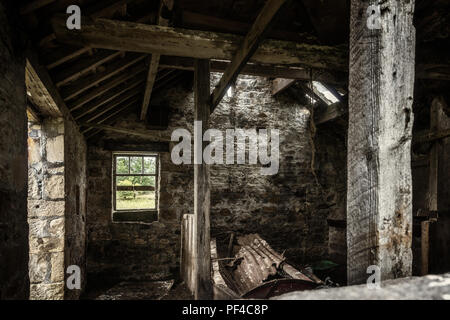 Inside an old stone barn in Yorkshire Stock Photo