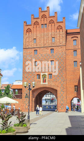 OLSZTYN, POLAND: Upper Gate in old town, called High Gate (polish: Brama Wysoka) - city gate existing since the 14th century Stock Photo