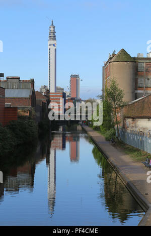 Part of the canal network in and around the city centre of Birmingham, UK.  The BT telecommunications tower is visible in the distance (2017 view). Stock Photo