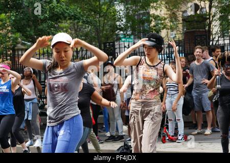 New York, USA. 18th Aug, 2018. People dance during the '2018 Summer Streets event' in Manhattan, New York, the United States, Aug. 18, 2018. On the first three consecutive Saturdays in August, nearly seven miles of New York City's streets were shut down and were opened for people to play, run, walk and ride. Credit: Lin Bilin/Xinhua/Alamy Live News Stock Photo
