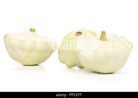 Group of three whole summer white pattypan squash isolated on white background Stock Photo