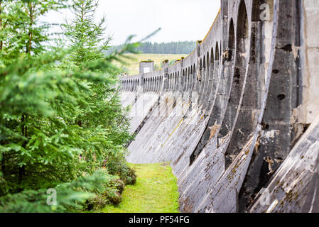 The Clatteringshaws Dam in the Galloway Forest Park in south west Scotland. Built by Sir Alexander Gibb & Partners in 1932-38, it is on the south west Stock Photo