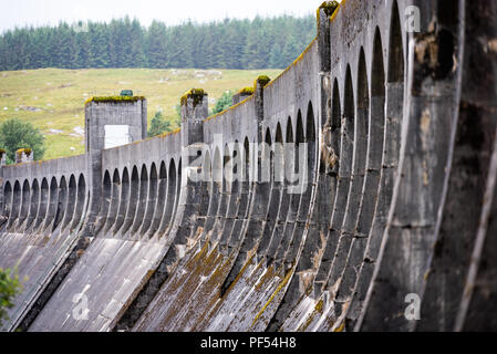 The Clatteringshaws Dam in the Galloway Forest Park in south west Scotland. Built by Sir Alexander Gibb & Partners in 1932-38, it is on the south west Stock Photo