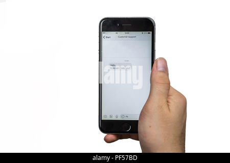 Customer Support Assistance Help Advice Client Concept, Asking a question online on a mobile phone Stock Photo