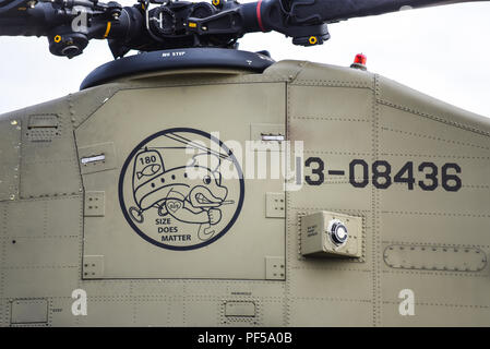 US Army Boeing CH-47F Chinook helicopter at the Farnborough International Airshow FIA, aviation, aerospace trade show. Size does matter slogan Stock Photo