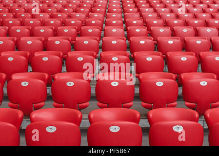 Red Stadium seats. Stock Photo