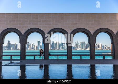 Doha, Qatar - Jan 9th 2018 - Locals and tourists enjoying a beautiful sunny day in the Museum of Islamic Arts (MIA) in the city center of Doha, Qatar Stock Photo