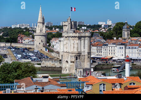 Tour de la Chaine and La Tour de la Lanterne or Tower of the Lantern in the Vieux Port in La Rochelle on the coast of the Poitou-Charentes region of F Stock Photo