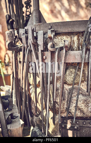 Old and oxide tools in a farm Stock Photo