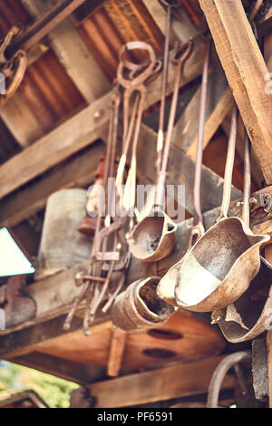 Old and oxide tools in a farm Stock Photo