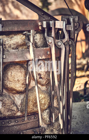 Old and oxide tools in a farm Stock Photo