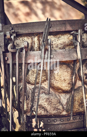 Old and oxide tools in a farm Stock Photo
