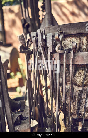 Old and oxide tools in a farm Stock Photo