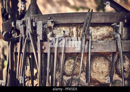 Old and oxide tools in a farm Stock Photo