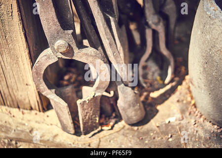 Old and oxide tools in a farm Stock Photo