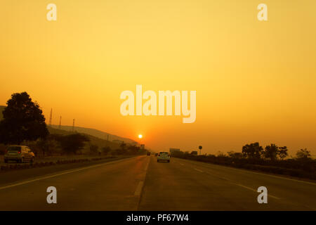 Sunset on Mumbai Pune Express highway, India, Stock Photo