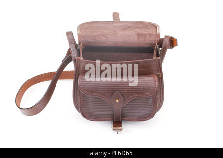 Leather hunting bag with brown ornament with patronage on white isolated background Stock Photo