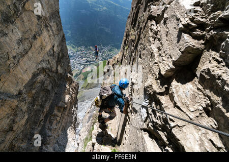 Climbing on the Gemmi-Daubenhornin via ferrata, Leukerbad, Switzerland, Europe Stock Photo