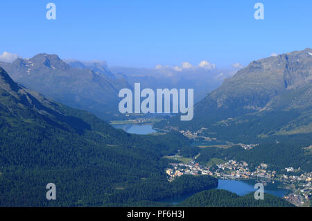 Swiss alps: The view from Muotas Muragl to the three glacier lakes in the upper Engadin at St. MOritz Stock Photo