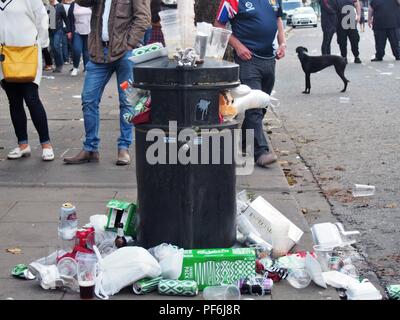 An Over Full Litter Bin after a Street Concert, Cockermouth Cumbria, England, United Kingdom Stock Photo