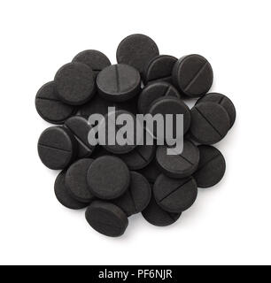 Top view of activated charcoal tablets isolated on white Stock Photo