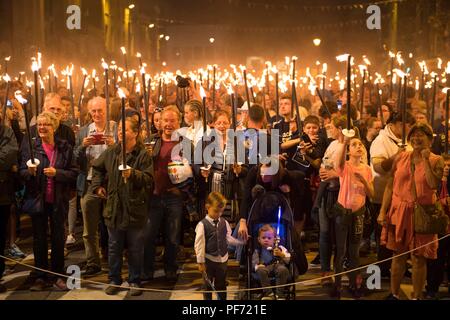 Bridport's famous Torchlight Procession makes it's way from Bucky Doo Square in the centre of town down to West Bay where the traditional fireworks and bonfire take place. It marks the end of the carnival weekend. Credit: Finnbarr Webster/Alamy Live News Stock Photo