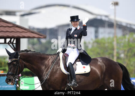 Jakarta, Indonesia. 20th Aug, 2018. Kuroki Akane of Japan greets the audience after the Equestrian Dressage Team final at the 18th Asian Games in Jakarta, Indonesia, Aug. 20, 2018. Credit: Du Yu/Xinhua/Alamy Live News Stock Photo