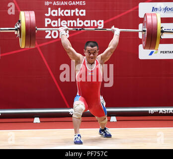 Jakarta, Indonesia. 20th Aug, 2018. Om Yun Chol of the Democratic People's Republic of Korea competes during the men's weightlifting 56kg event at the 18th Asian Games in Jakarta, Indonesia, Aug. 20, 2018. Credit: Li He/Xinhua/Alamy Live News Stock Photo