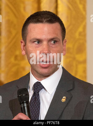 Washington, United States Of America. 20th Aug, 2018. Commissioner of United States Customs and Border Protection Kevin McAleenan speaks on a panel at an event hosted by US President Donald J. Trump titled a 'Salute to the Heroes of the Immigration and Customs Enforcement and Customs and Border Protection' in the East Room of the White House in Washington, DC on Monday, August 20, 2018. Credit: Ron Sachs/CNP | usage worldwide Credit: dpa/Alamy Live News Stock Photo