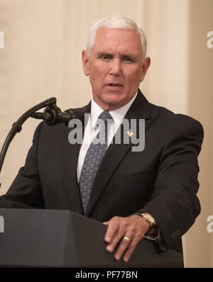 Washington, District of Columbia, USA. 20th Aug, 2018. United States Vice President Mike Pence makes introductory remarks prior to US President Donald J. Trump speaking as he hosts a ''Salute to the Heroes of the Immigration and Customs Enforcement and Customs and Border Protection'' in the East Room of the White House in Washington, DC on Monday, August 20, 2018 Credit: Ron Sachs/CNP/ZUMA Wire/Alamy Live News Stock Photo