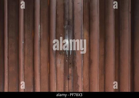 Background of old metal door in grungy style. Stock Photo
