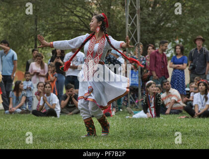 Pamiri woman dancing at the 'Roof of the World' festival in Khorog, Tajikistan Stock Photo