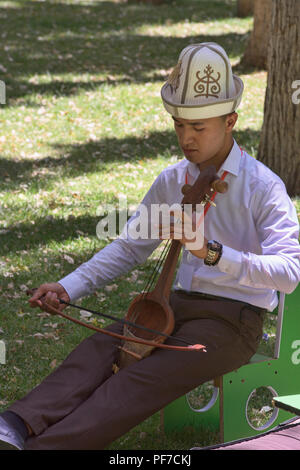 Traditional Kyrgyz musician, Khorog, Tajikistan Stock Photo