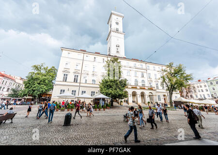 Lviv, Ukraine - July 31, 2018: Exterior view of historic Ukrainian Polish city in old town market square, Ratusha City Hall wide angle building archit Stock Photo