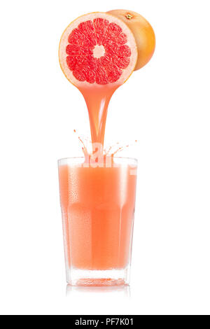 Pure grapefruit juice pouring out from fruit into glass isolated on white background Stock Photo