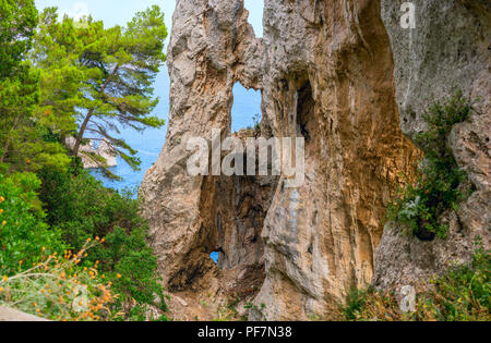 The Arco Naturale (Arch Natural) on Capri, Italy, as viewed from nearby viewing area.