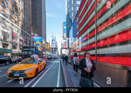 Traffic and commuters at Times Square in New York City Stock Photo