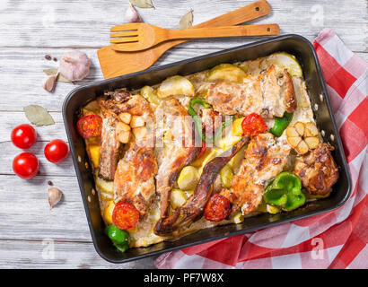 Stewed rabbit with vegetables, traditional maltese cuisine. Stock Photo